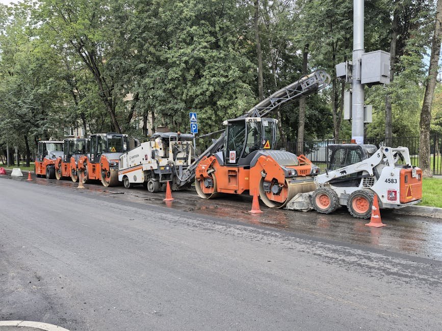 Máquina executando obra em pavimento rodoviário