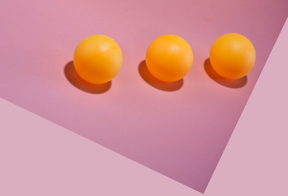Globo de sorteio com bolas numeradas amarelas